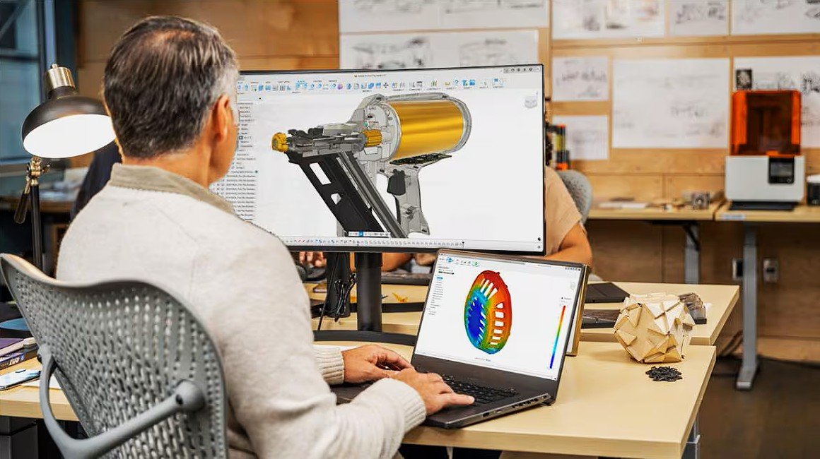 Product engineer reviewing a component design for manufacturability using DFM analysis