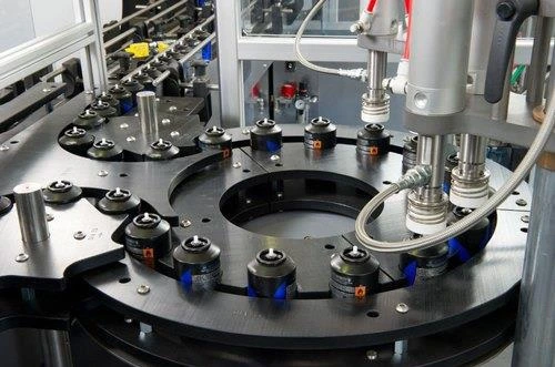 Custom special purpose machines for high-volume production processes